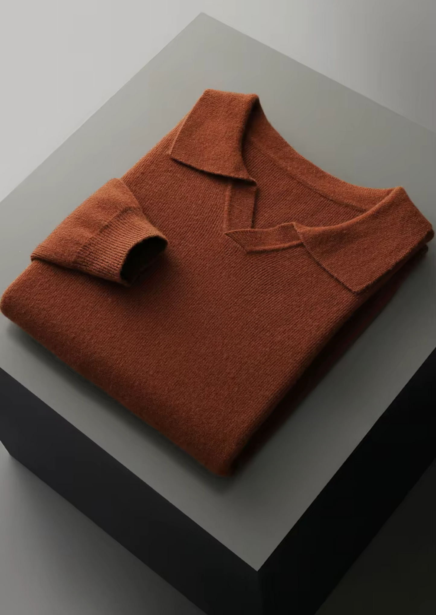 PURE EXTRA-FINE MERINO WOOL RIBBED BUTTONLESS POLO